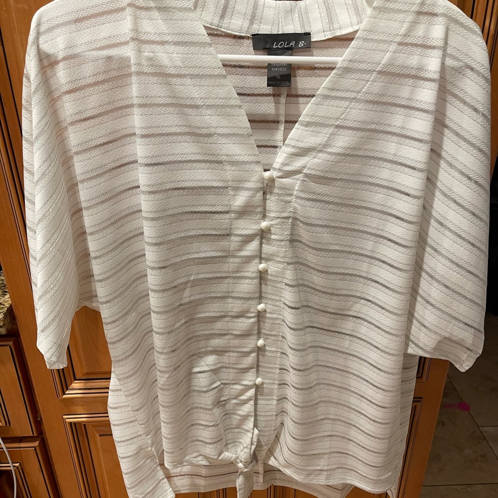 Very cute white blouse. Never worn